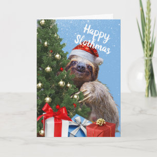 Slothy Navidades Slothy en Santa Hat y la tarjeta 