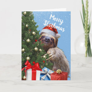 Slothy Navidades Slothy en Santa Hat y la tarjeta 