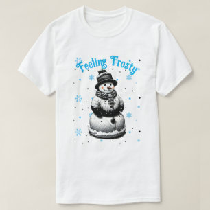 Snowman siente la camiseta de los Navidades congel