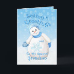 Snowman Wonderland para tarjeta de Navidades nieto<br><div class="desc">Pequeño y simpático muñeco de nieve con gorra azul de invierno y mitones a medida que delicadas copas de nieve caen por el cielo azul es un diseño de Navidades deliciosos para saludar a tu nieto especial. También puedes disfrutar de sellos y regalos a juego disponibles en mi tienda. Arte...</div>