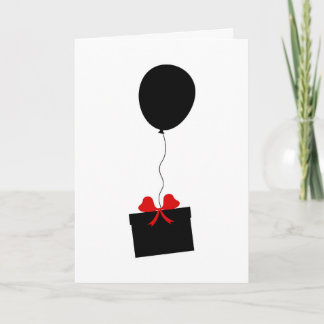 Sobre la tarjeta de cumpleaños del globo del negro