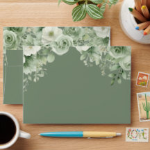 Sobres personalizados de boda con flores blancas y