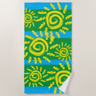 Sol espiral divertido en toalla de playa verde