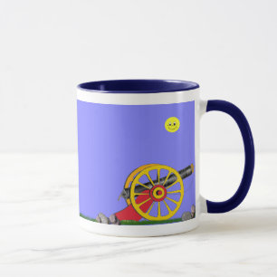Soldado de juguete y taza del cañón del juguete