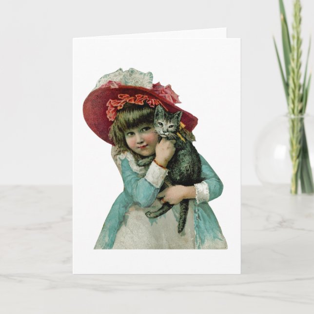 Sostener un gatito del navidad (Anverso)