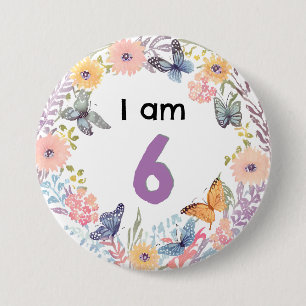 Soy un bonito pin floral de mariposa con botón