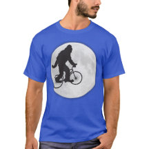Squatch en bicicleta con camiseta de la luna