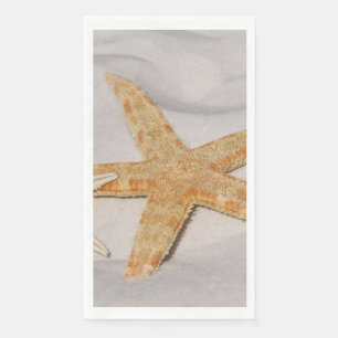 Starfish en la servilleta de papel de invitado de 