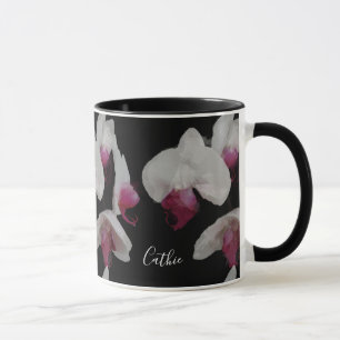 Su taza conocida de las orquídeas de la acuarela