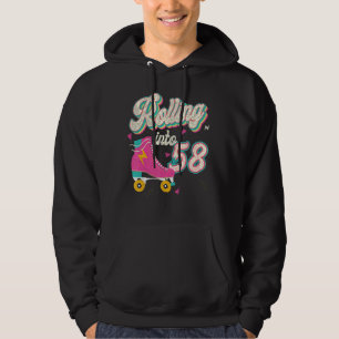 Sudadera 58.º patinaje de natalidad en 58 años