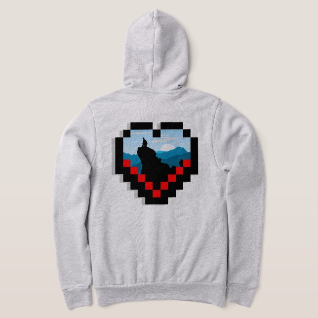 Sudadera A lone figure sitting on a mountain peak at sunris (Distribución Reverso )