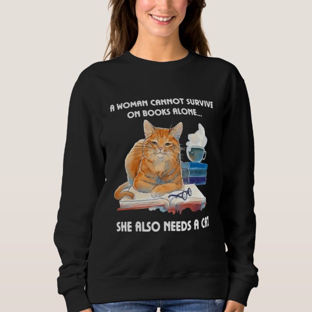 Sudadera A Woman Cannot Survive On Books Alone She Also Nee (Anverso)