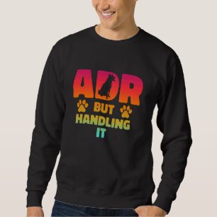 Sudadera ADR, pero manejando la divertida veterinaria