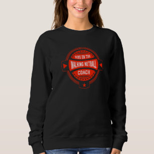 Sudadera Bebés en el entrenador de Netball que camina en Ne