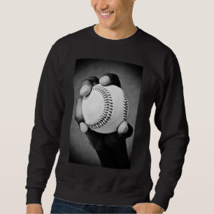 Sudadera béisbol en mano
