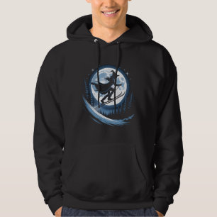 Sudadera Bruja en los esquís bajo la luna llena