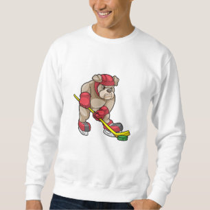 Sudadera Bulldog en hockey sobre hielo con bastón de hockey