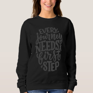 Sudadera Cada viaje necesita un primer paso cita inspiració
