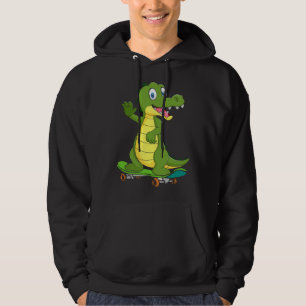 Sudadera Caimán con monopatín patinando chico patinador