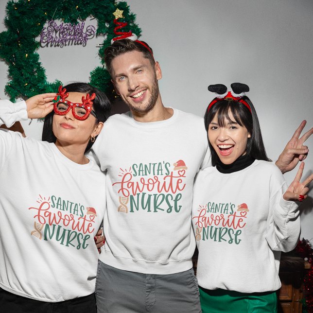 Sudadera Camiseta de navidades de enfermería favorita de Sa (Santa's Favorite nurse christmas sweatshirt
)