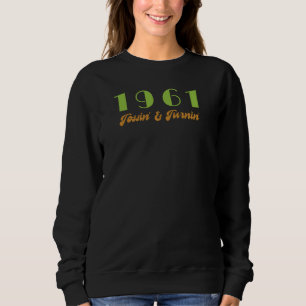 Sudadera Canción principal de 1961 por año