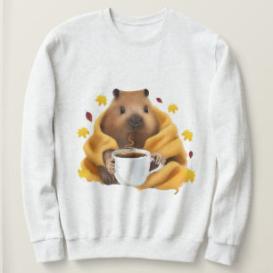 Sudadera CapyBarri en una manta acogedora relajándose y beb
