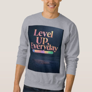 Sudadera "Cargando grandeza... un día a la vez"