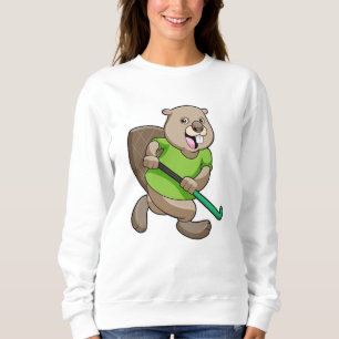 Sudadera castor en hockey con bate de hockey