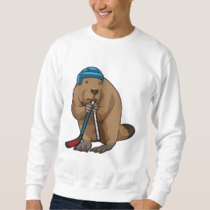 Sudadera castor en hockey sobre hielo con bastón de hockey 