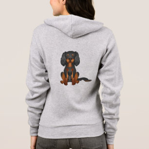 Sudadera Cavalier King Charles Spaniel negro y marrón senta