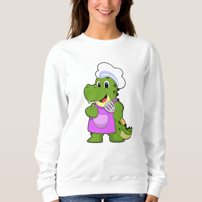 Sudadera Cocodrilo como cocinero con espátula (Anverso)