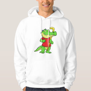 Sudadera Cocodrilo en hockey sobre hierba con palo