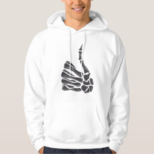 Sudadera con capucha blanca y mano de esqueleto ha