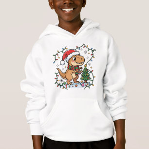 Sudadera con capucha de niño decorando árbol de Na