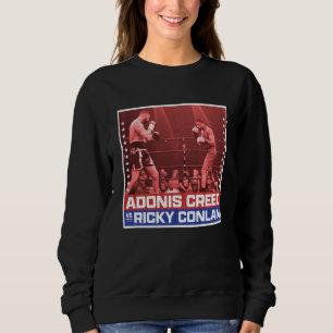 Sudadera Creed vs Conlan cuadrilátero de boxeo rojo