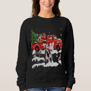 Sudadera Creste chino montando camioneta roja Feliz Navidad