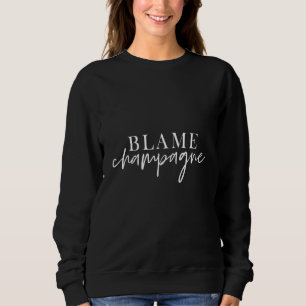 Sudadera Culpar a Champagne tomando Brunch diciendo