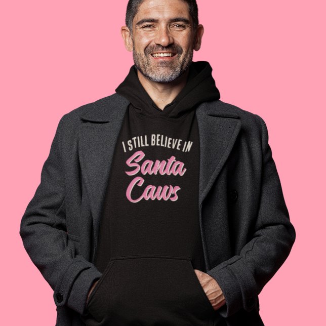 Sudadera Curioso que creo en los Navidades de Santa Caws (Stay warm and stylish with this funny winter "I believe in Santa Caws" black Christmas hoodie!)