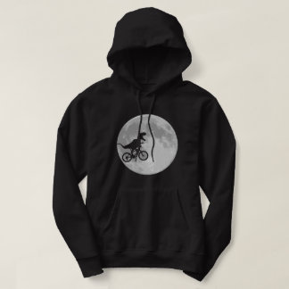 Sudadera Dinosaurio en bicicleta en cielo con luna