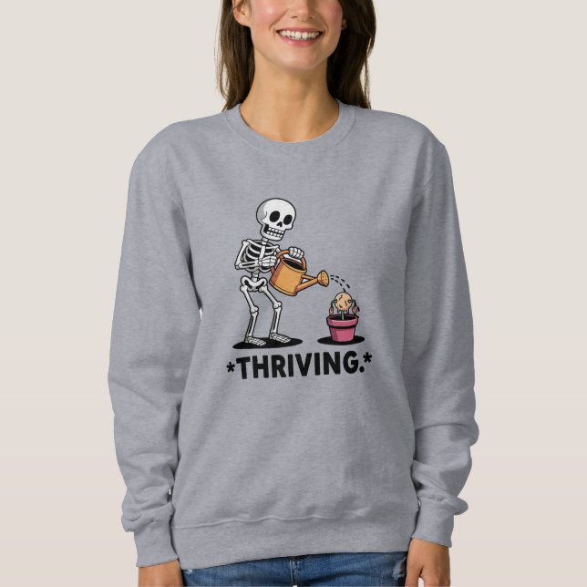 Sudadera Diseño esquelético sarcástico "Thriving" (Anverso)