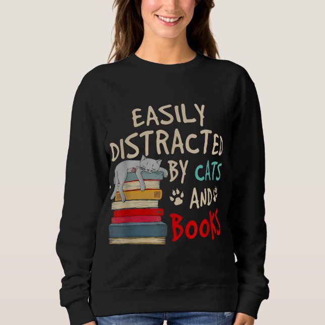 Sudadera Distracción fácil por gatos y libros - gato y libr (Anverso)