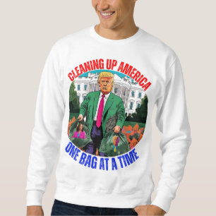 SUDADERA DONALD TRUMP LIMPIANDO A ESTADOS UNIDOS UNA BOLSA