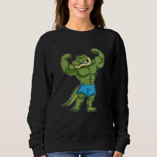 Sudadera El cocodrilo como la construcción de cuerpos extre