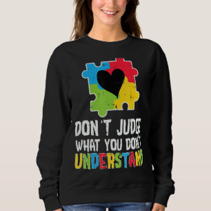 Sudadera El corazón del rompecabezas no juzga lo que no ent
