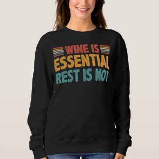 Sudadera El Vino Es Esencial El Resto No
