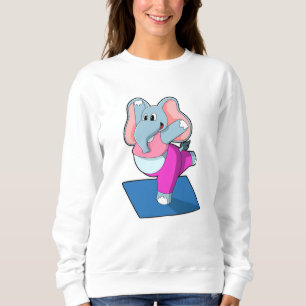 Sudadera Elefante en ejercicios de Stretching de Yoga en pi