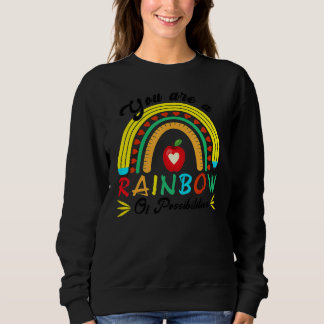 Sudadera Eres un arcoíris de posibilidades enseñando  Enseñ