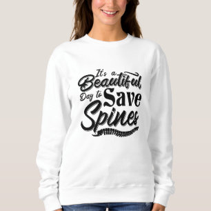 Sudadera Es un lindo día quiropráctico quiropráctico