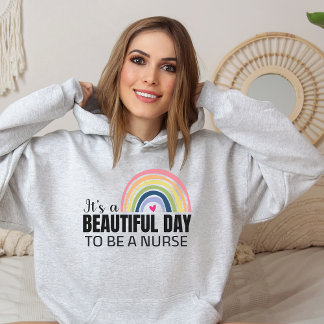 Sudadera Es una bella enfermera de día: Rainbow Hoodie
