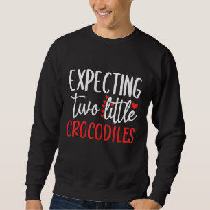 Sudadera Esperando dos pequeños cocodrilos gemelos de embar